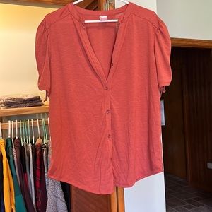 Button up orange short sleeve shirt